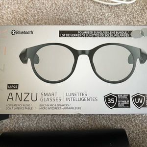 Razed smart glasses, it has extra lenses. Sun glasses black tanned.